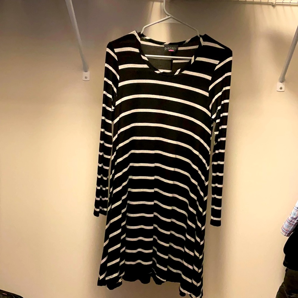 Long sleeved striped dress.